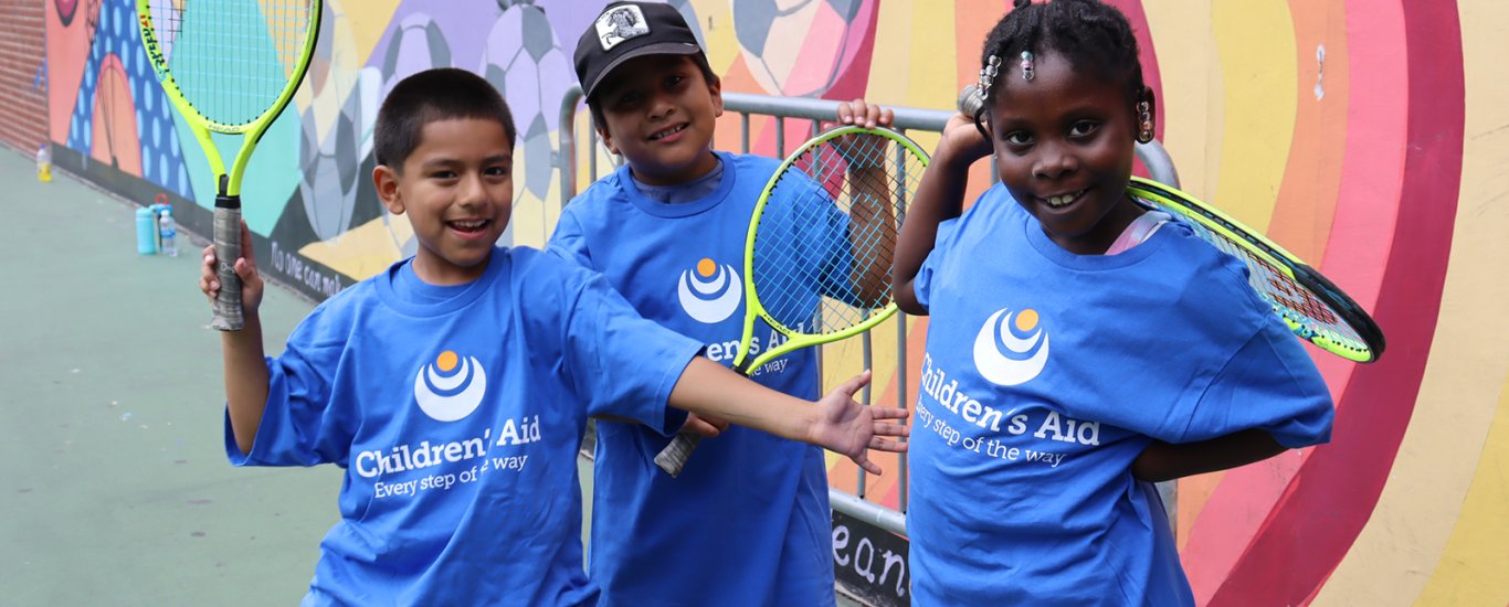 Children's Aid kids playing tennis