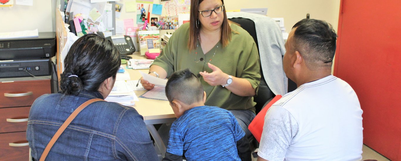 Early Childhood program staff with family