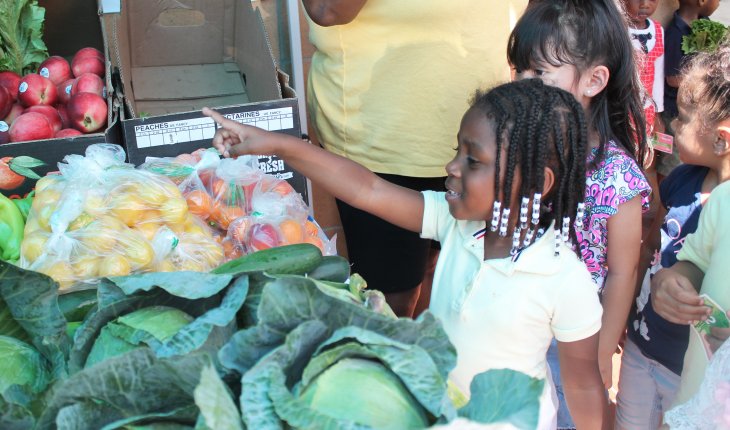 Child at Food Box Distribution