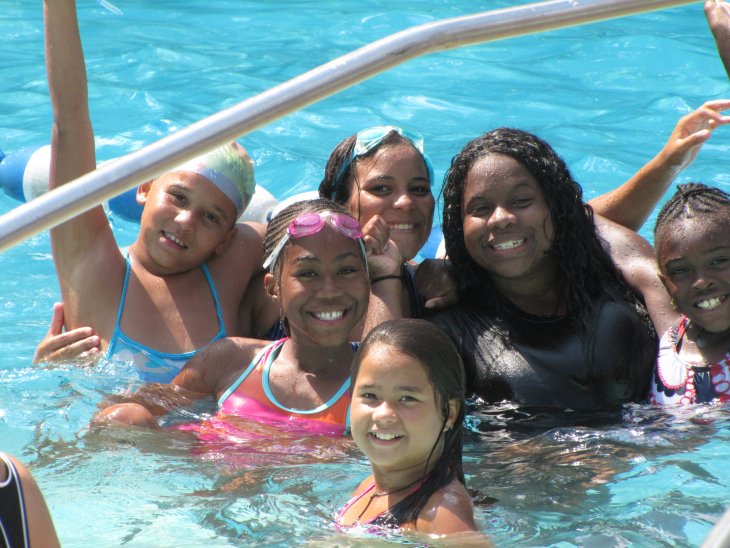 Kids swimming at Wagon Road summer camp