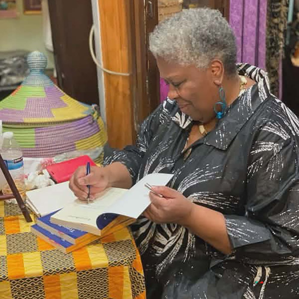 Judy Edwards signing book