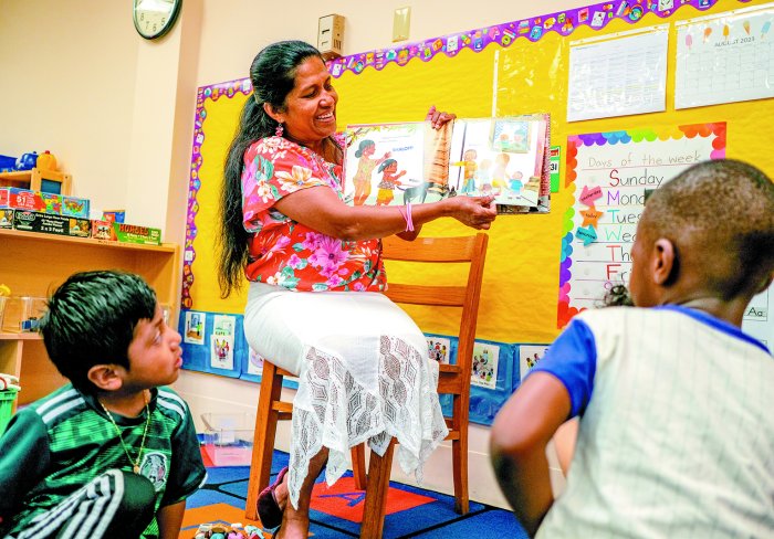 Teacher reading to students