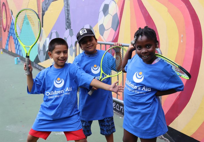 Children's Aid kids playing tennis