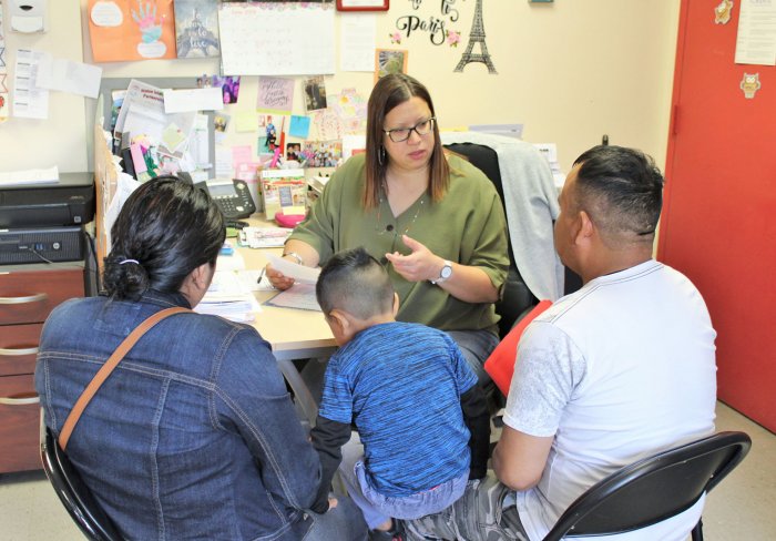 Early Childhood program staff with family