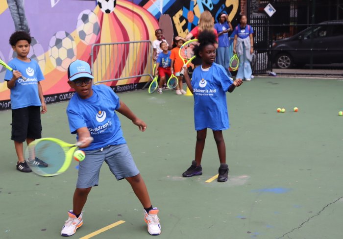 Student practicing forehand