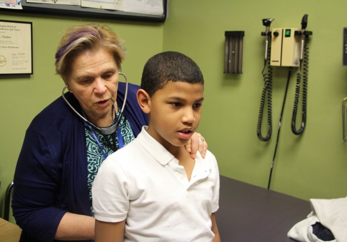 Student being examined by doctor