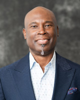 Trevor M. John