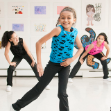 Kids dancing in colorful outfit