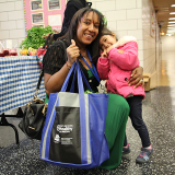 Mother and daughter buying groceries 