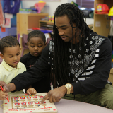 Teacher with students