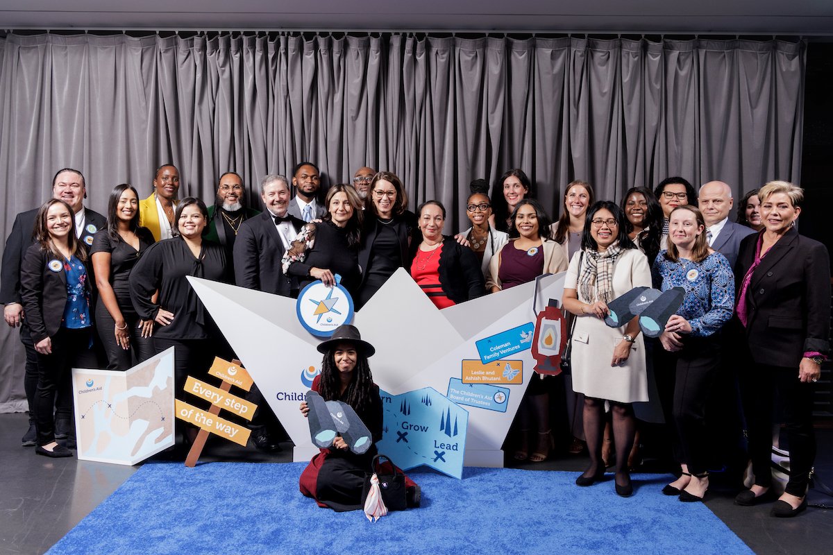 Children's Aid Staff Honoree Representatives and President and CEO Phoebe Boyer (center).