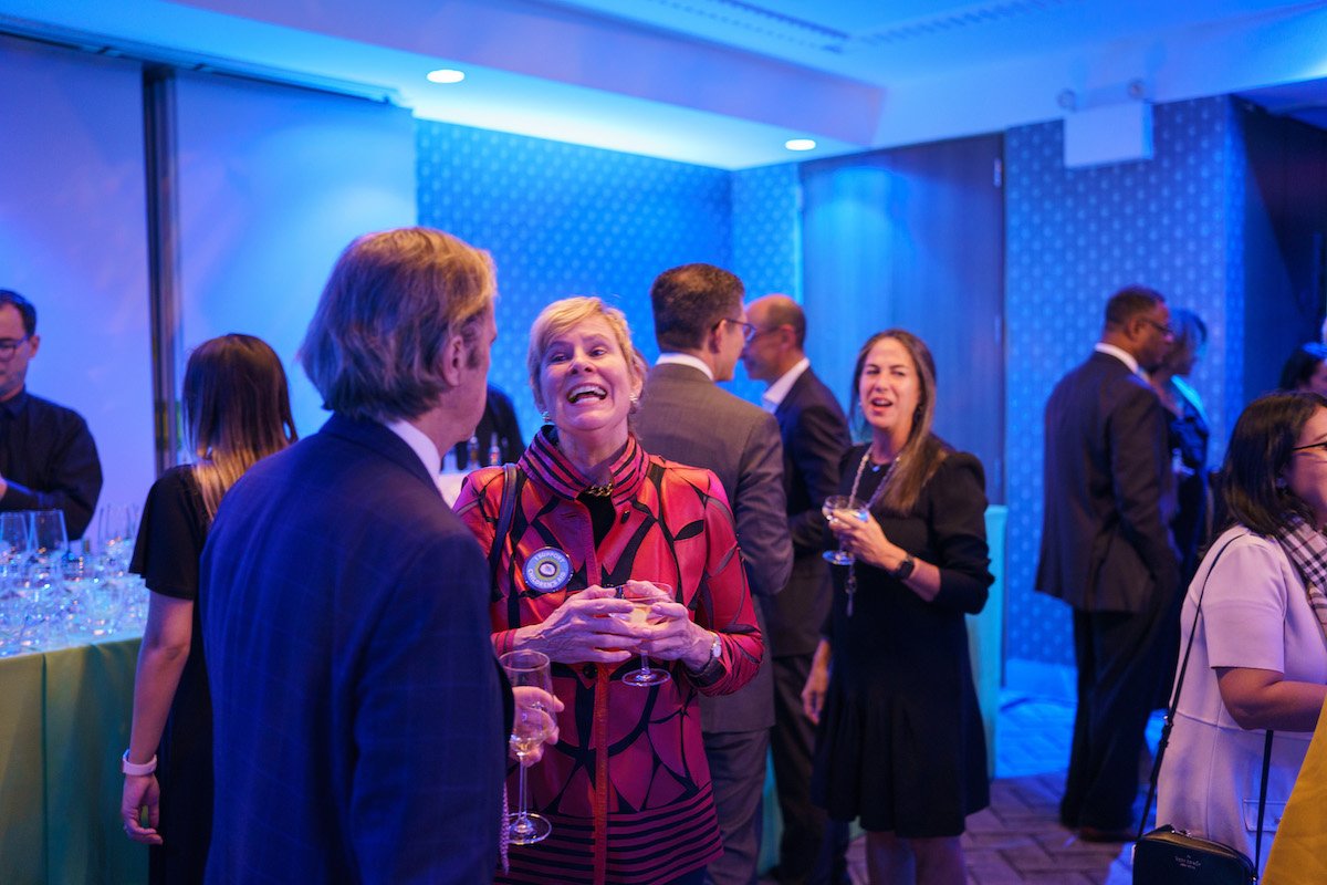 Guests mingling at Cocktails.