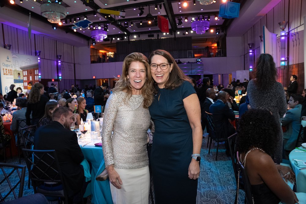 Board Chair Jill Olson and Phoebe Boyer during dinner