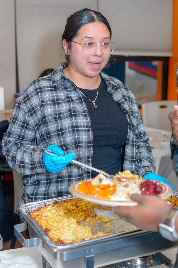 NGC Staff serving food