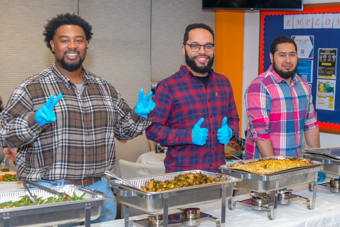 NGC Staff serving food