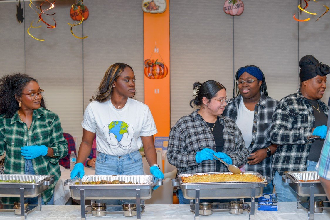 NGC Staff serving food