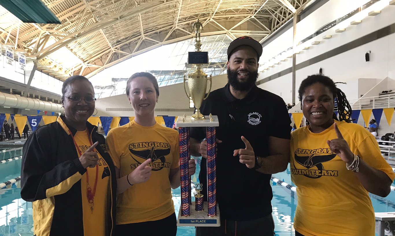 Stingrays Swim Team with coach and parents